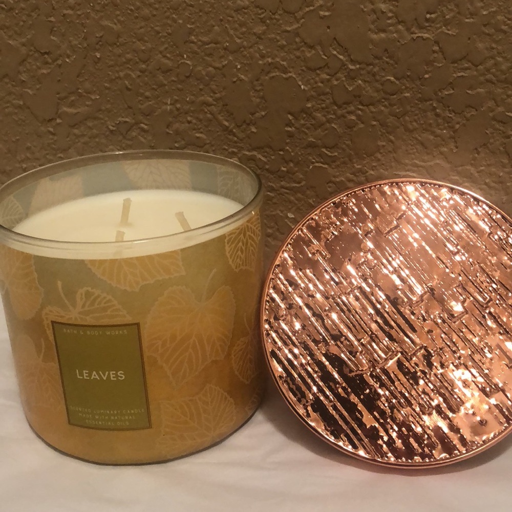 NWT Bath & Body Works Leaves 3 wick candle. Limited edition Hammered copper lid.
